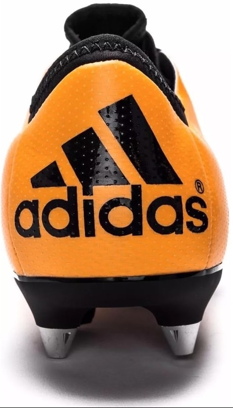 chuteira adidas de trava